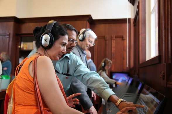 Mr Venkatsubramaniam demonstrates the music archive's touch screen stations  